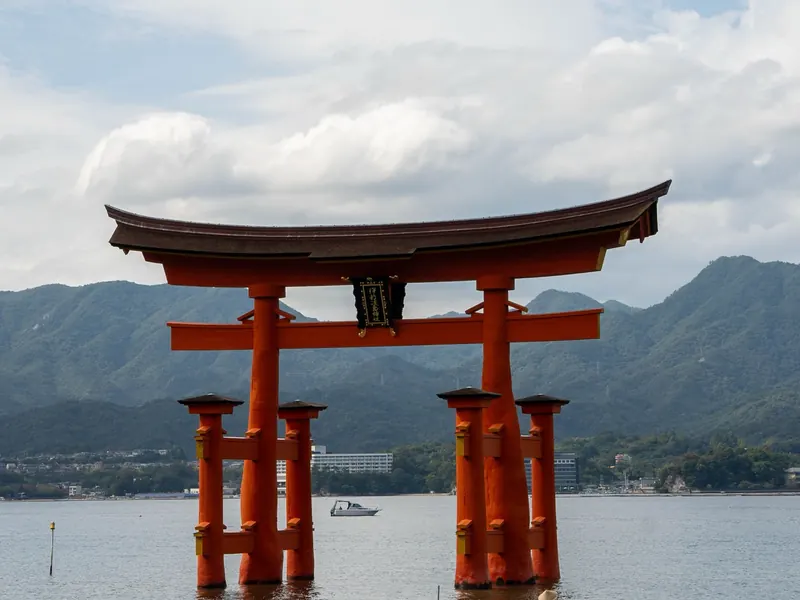 Floating torii gate of Itsukushima Shrine standing in the sea at Miyajima